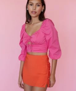 AT New Threads Beck Button Mini Skirt